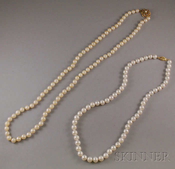 Appraisal: Two Strands of Cultured Pearls one with a kt gold