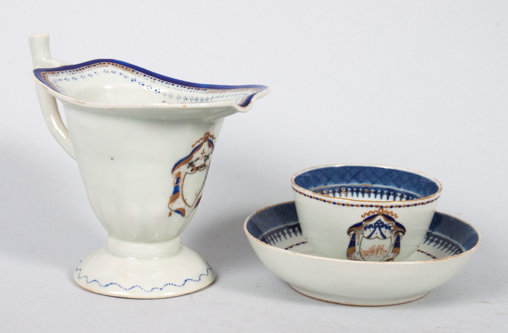 Appraisal: Chinese Export porcelain cup and saucer creamer circa helmet-form cream