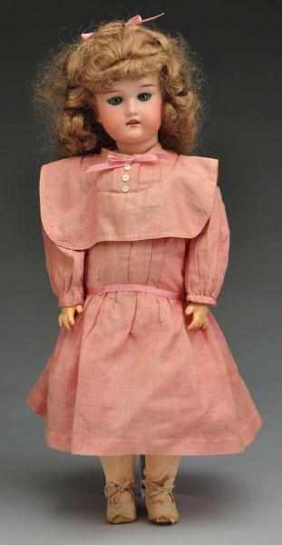 Appraisal: Pretty Dressel Bisque Child Doll Description German bisque socket head