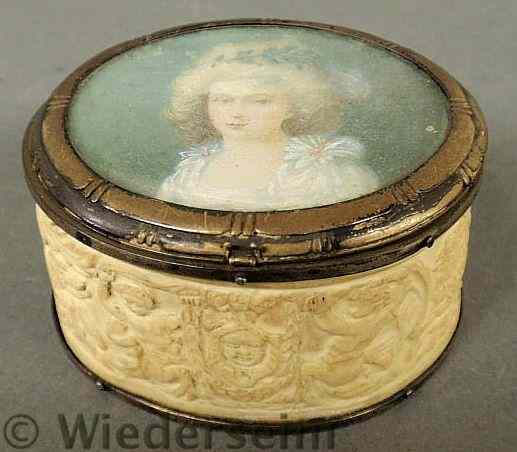 Appraisal: Oval French carved ivory box early th c decorated with