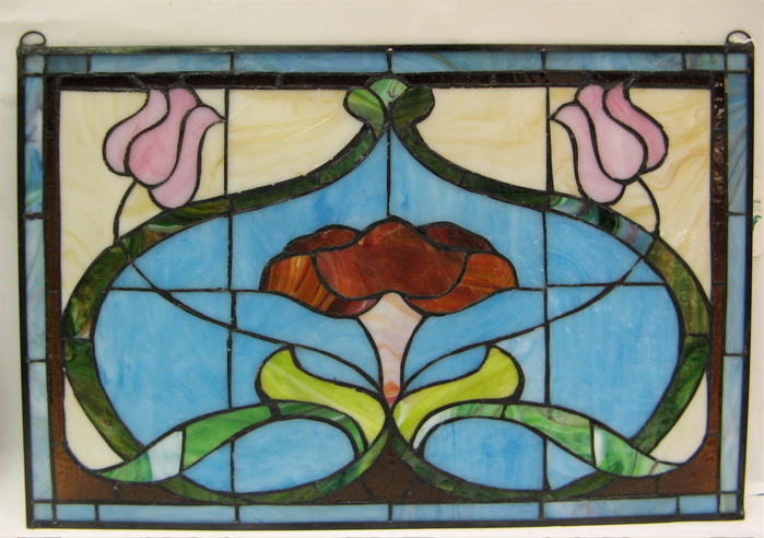 Appraisal: PAIR STAINED AND LEADED ART DECO STYLE WINDOW PANELS Stylized