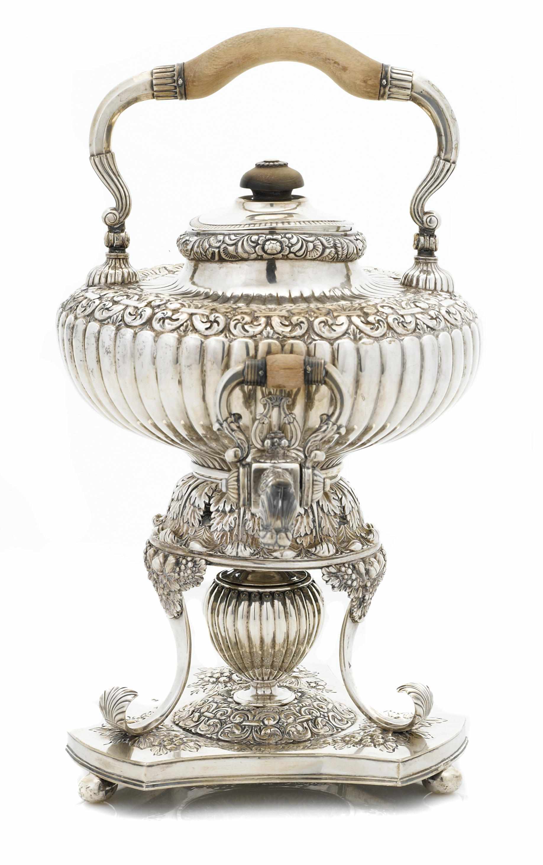 Appraisal: A Dutch standard silver kettle on lamp stand Retailed by