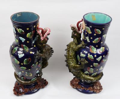 Appraisal: A pair of blue ground decorative vases each with stylised