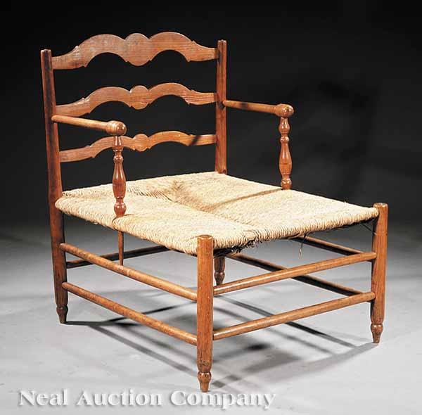 Appraisal: A Louis XV Provincial Oak Ladderback Chaise Longue late th