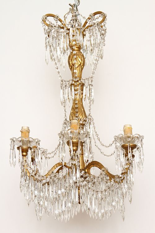 Appraisal: ARM GILT WOOD WROUGHT IRON CRYSTAL CHANDELIER A six arm