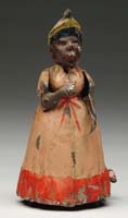 Appraisal: GUNTHERMANN HAND-PAINTED WOMAN Colorful black woman in pink dress with