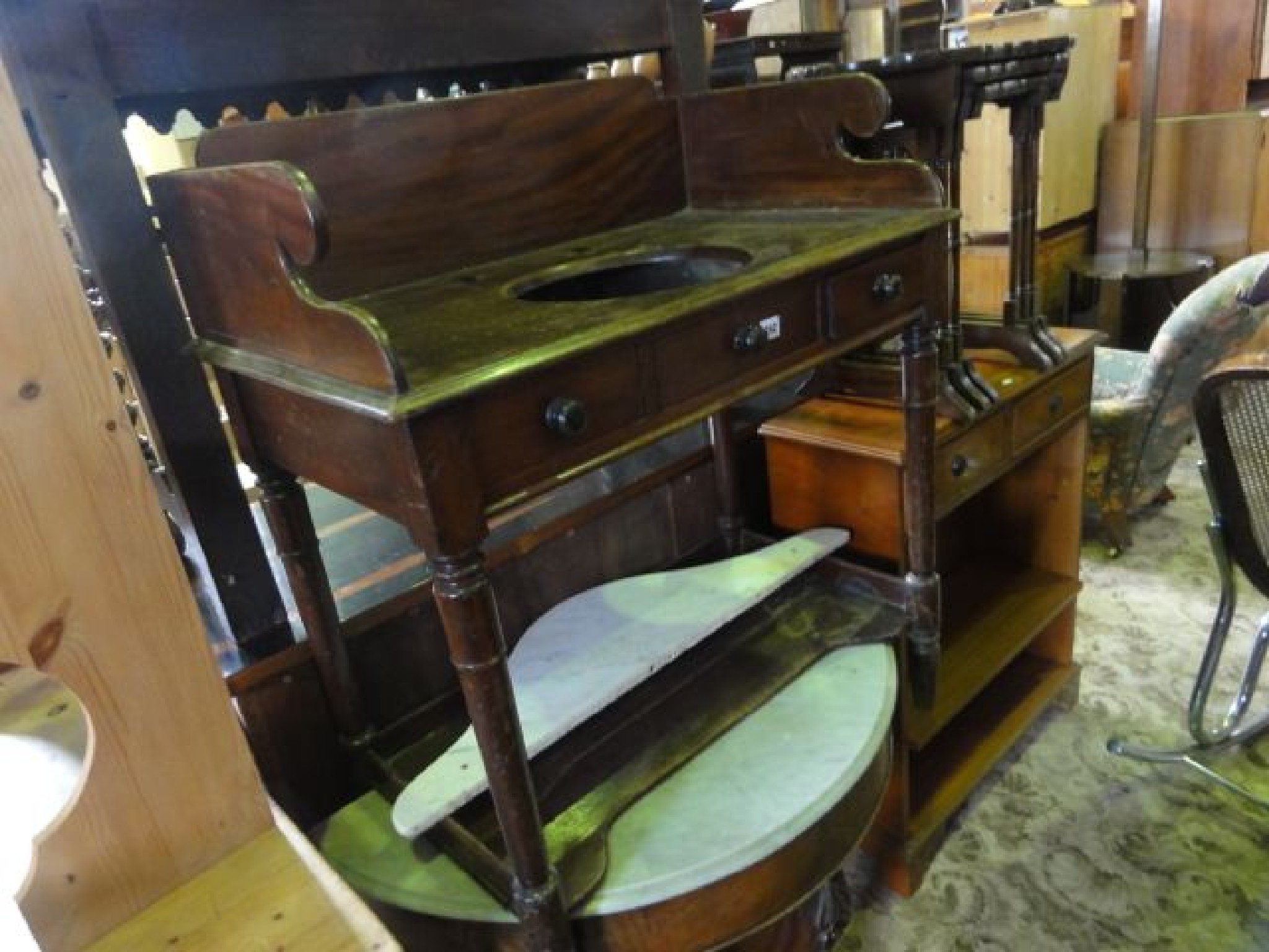 Appraisal: A th century mahogany washstand of rectangular form with raised