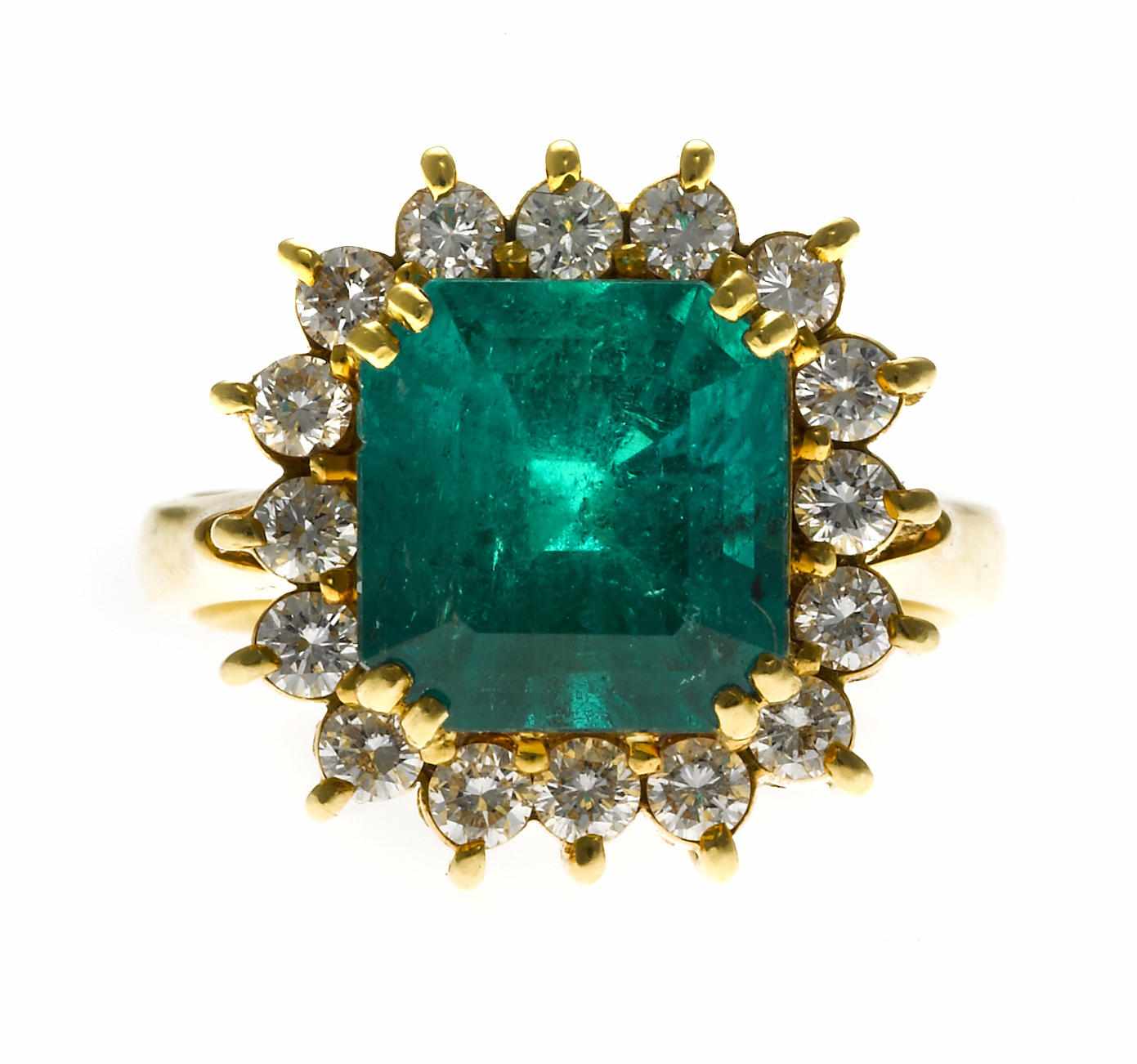 Appraisal: An emerald and diamond ring cut-corner square step-cut emerald weighing