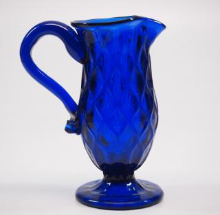 Appraisal: Pattern A late th century Stiegel type pattern-molded glass creamer