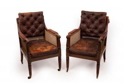 Appraisal: A pair of William IV mahogany library berg re armchairs