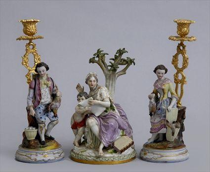 Appraisal: MEISSEN PORCELAIN FIGURE GROUP AND A PAIR OF GILT METAL-MOUNTED