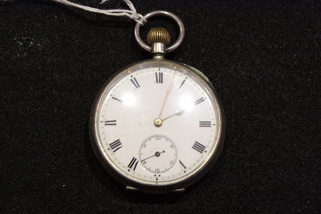 Appraisal: A WHITE METAL POCKET WATCH with top wind mechanism and