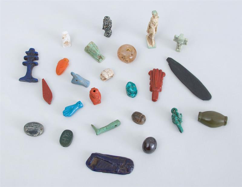 Appraisal: GROUP OF EGYPTIAN STONE AND FAIENCE AMULETS AND SCARABS Including