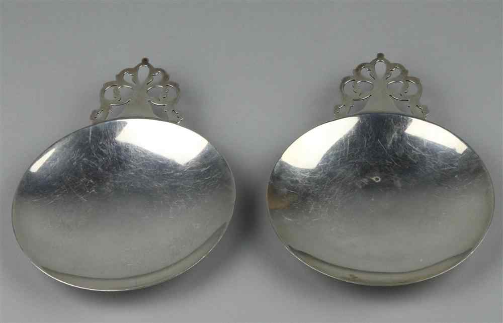 Appraisal: GORHAM STERLING SHELL FORM DISH together with a silver circular