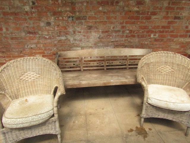 Appraisal: Conservatory furniture being a hardwood bench two wicker chairs and