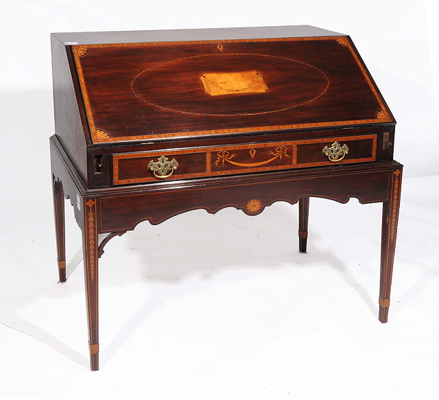 Appraisal: A MAHOGANY INLAID BUREAU ON STAND fall front with cross