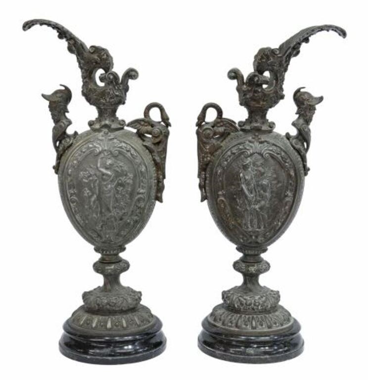 Appraisal: pair Neoclassical patinated metal ewer-form garnitures th c foliate spout