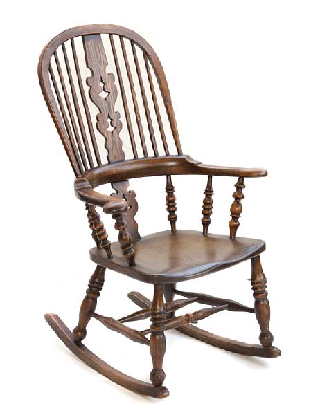 Appraisal: An English Provincial Windsor rocking chair height in width in