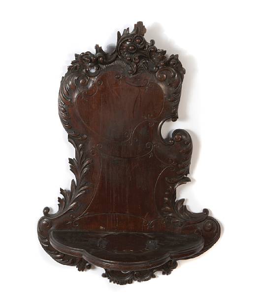 Appraisal: A Continental Rococo style carved wall bracket losses height in