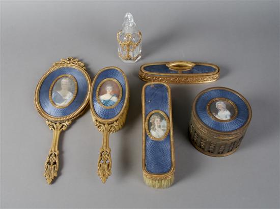 Appraisal: A Gilt and Enameled Dresser Set France Height of tallest