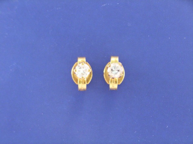 Appraisal: A pair of ct gold diamond stud earrings estimated total