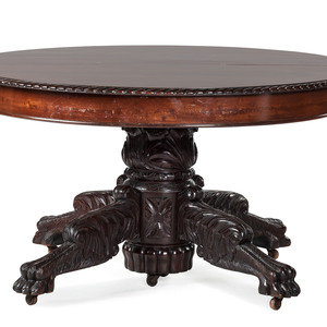 Appraisal: A Classical Carved Mahogany Extension Dining Table In the manner