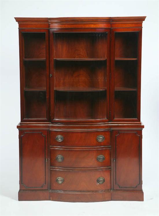 Appraisal: CHINA CABINET Mahogany with a curved glass door and three