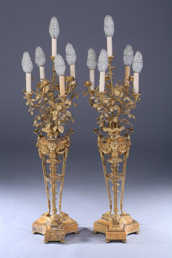 Appraisal: PAIR LOUIS XVI-STYLE BRONZE-DOR MOUNTED MARBLE BRAZIER-FORM FIVE-LIGHT CANDELABRA th