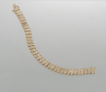 Appraisal: A Diamond Bracelet in Gold Unmarked yellow gold bracelet constructed