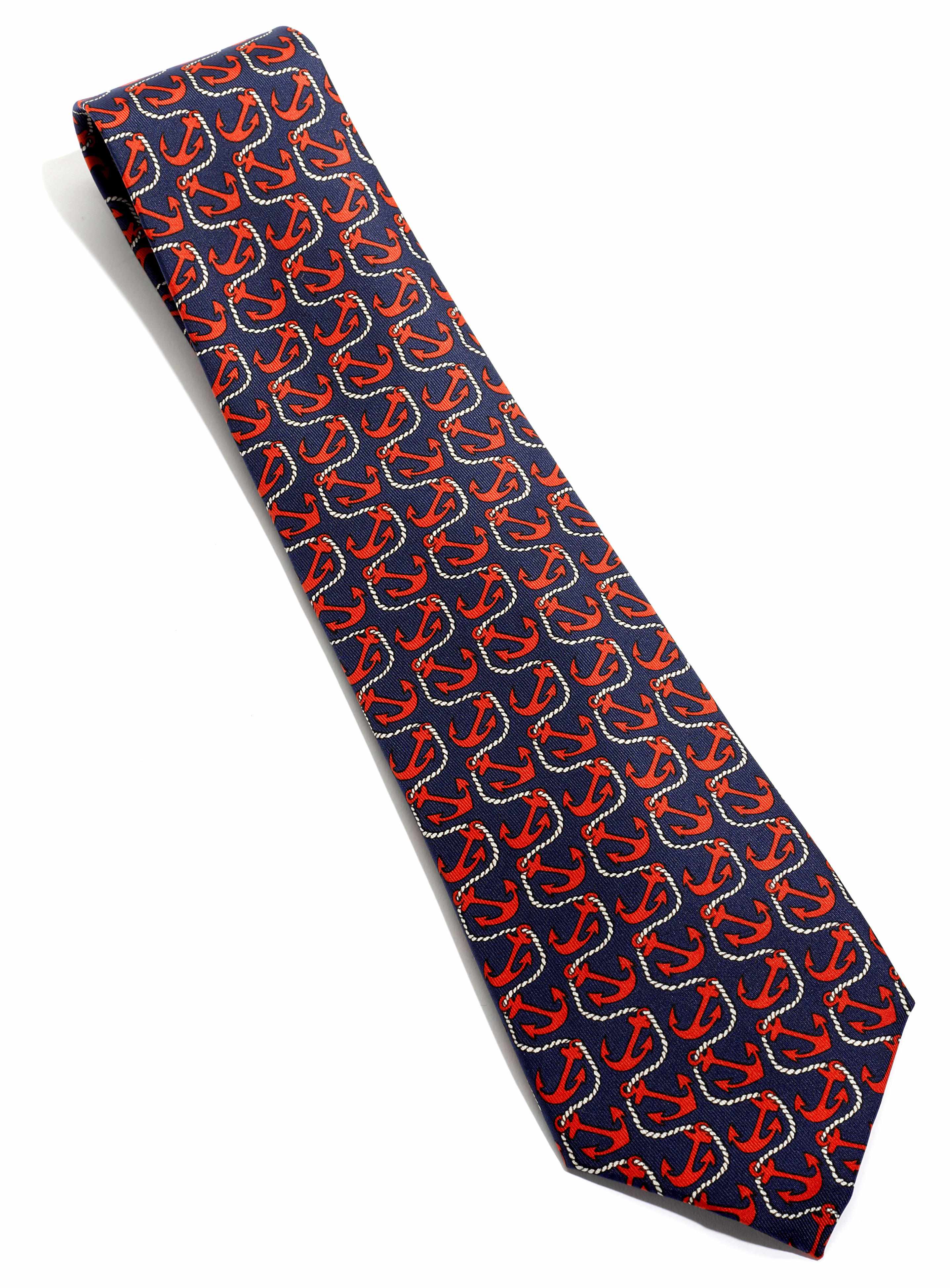 Appraisal: An Hrmes blue and red anchor motif tie together with