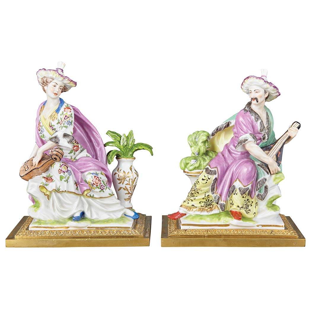 Appraisal: Pair of Samson Polychrome Decorated Porcelain Courting Figures In the