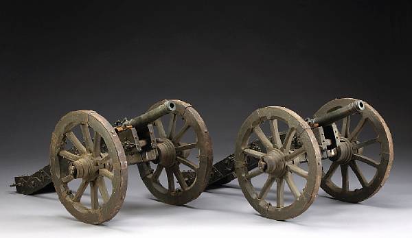 Appraisal: A pair of bronze cannons with associated field carriagesprobably th