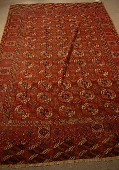 Appraisal: An Antique Tekke Bokkhara Rug worn and with repairs '