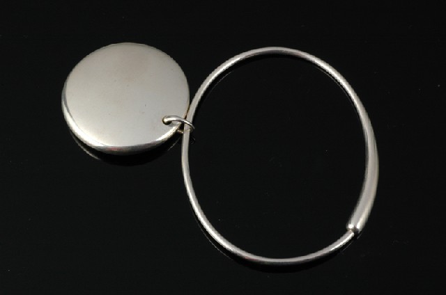 Appraisal: A GEORG JENSEN SILVER BANGLE Designed by Jacqueline Rabun the