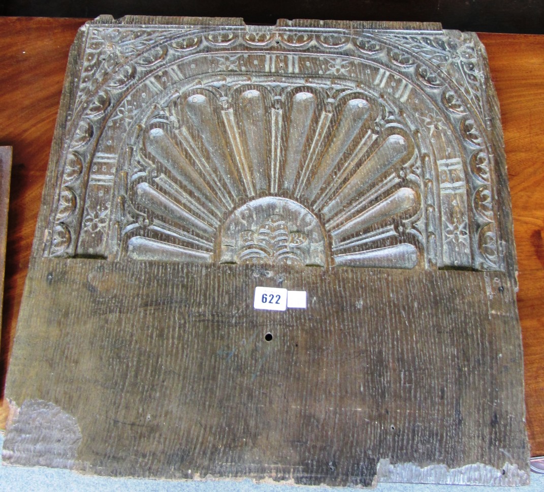 Appraisal: A th century carved oak panel with single lunette cm