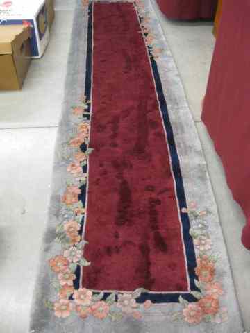 Appraisal: Chinese Handmade Sculptured Wool Rug floral with grey border burgundy