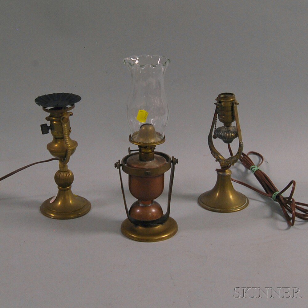 Appraisal: Three Brass Lanterns with one colorless glass shade two electrified