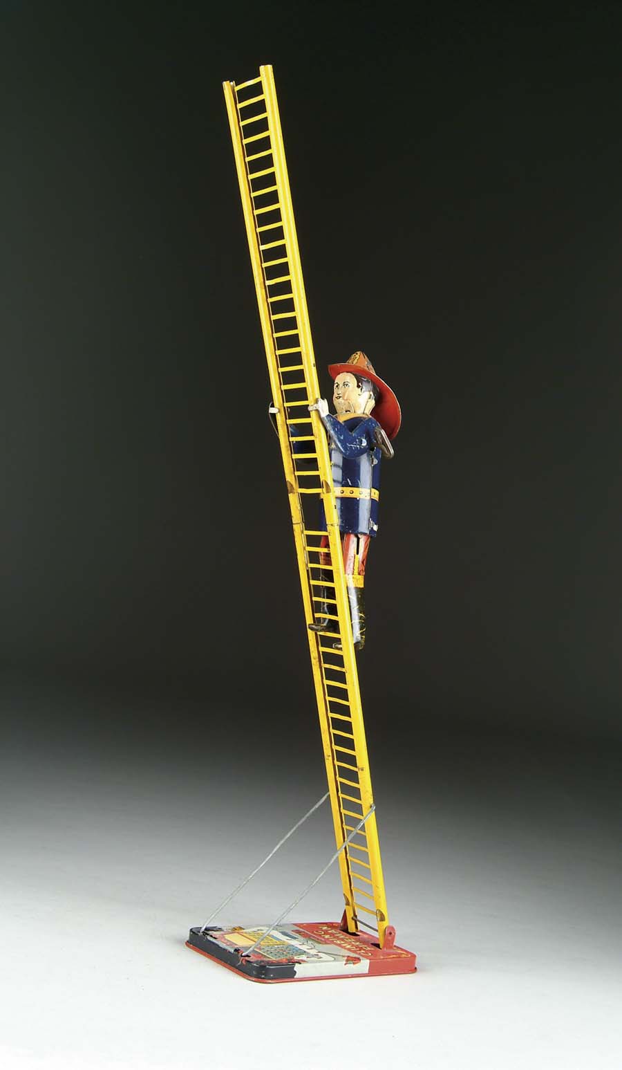 Appraisal: MARX CLIMBING FIREMAN U S A All tin toy features