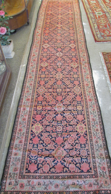 Appraisal: SEMI-ANTIQUE PERSIAN TRIBAL LONG RUG Hamadan Villages region overall Herati