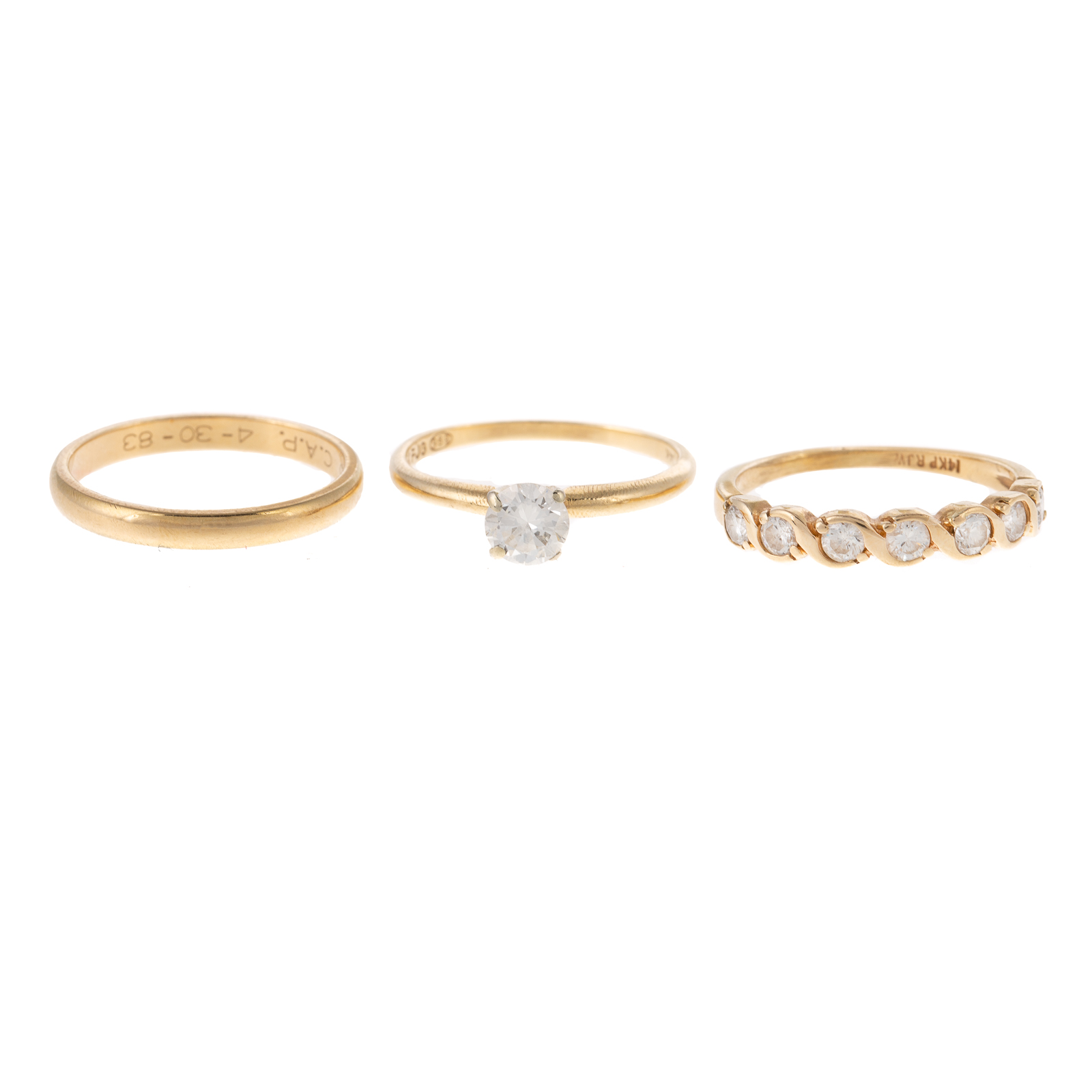 Appraisal: A DIAMOND SOLITAIRE TWO BANDS IN K K yellow gold