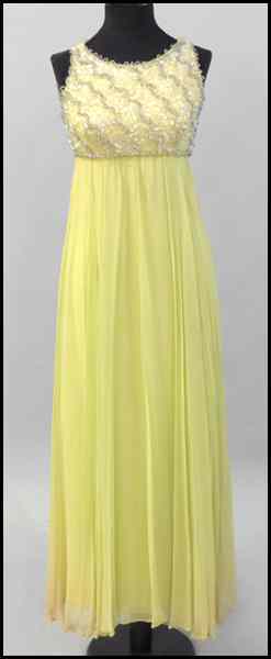 Appraisal: SAKS FIFTH AVENUE CHARTREUSE CHIFFON GOWN Comprised of a beaded