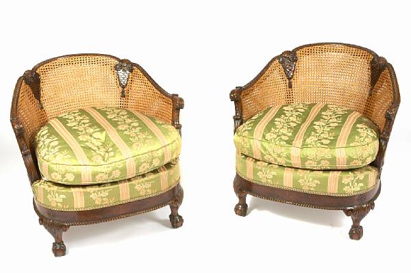 Appraisal: A pair of Regency style cane back arm chairs height