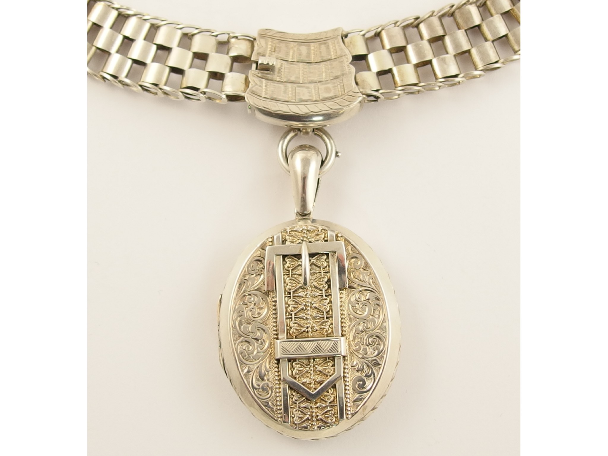 Appraisal: A silver Victorian locket and chainthe locket is stamped Birmingham