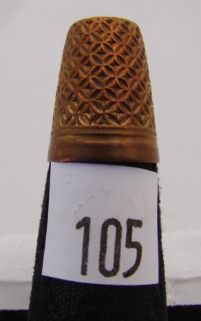 Appraisal: Gold tone thimble with folk design