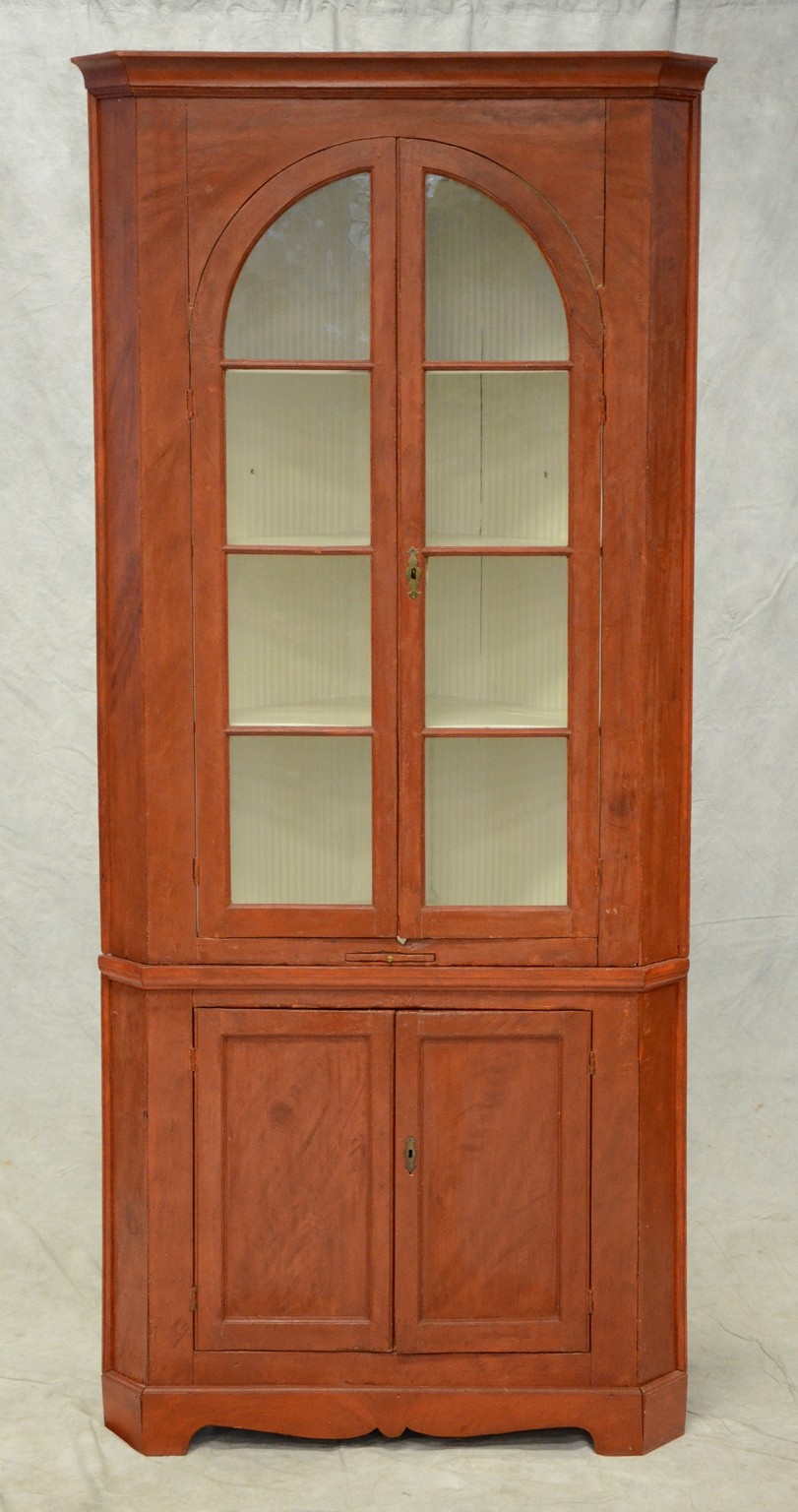 Appraisal: piece pine corner cupboard top section with arched glazed doors