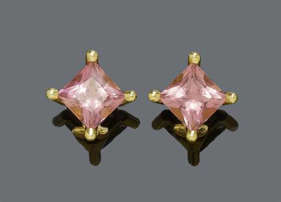 Appraisal: PINK TOURMALINE EARCLIPS Pink gold Decorative ear clips of large