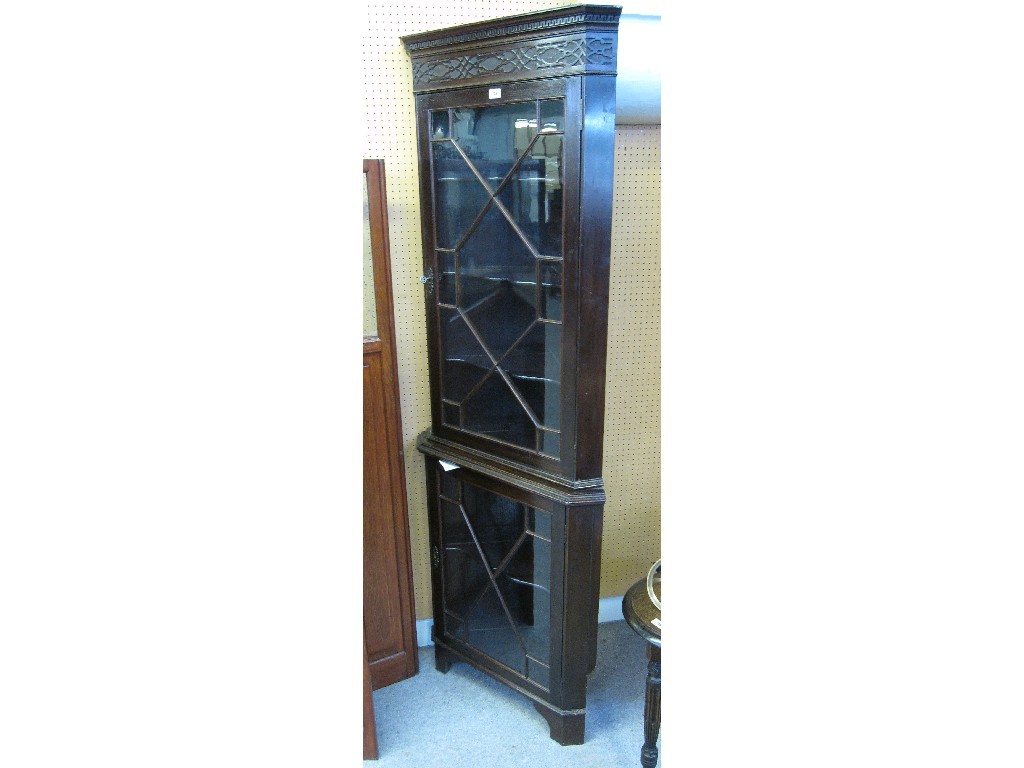 Appraisal: Astragal glazed corner cabinet with blind fret decoration