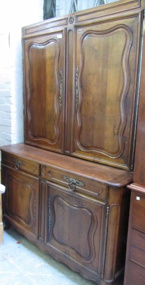 Appraisal: A th century French walnut dresser the pair of shaped