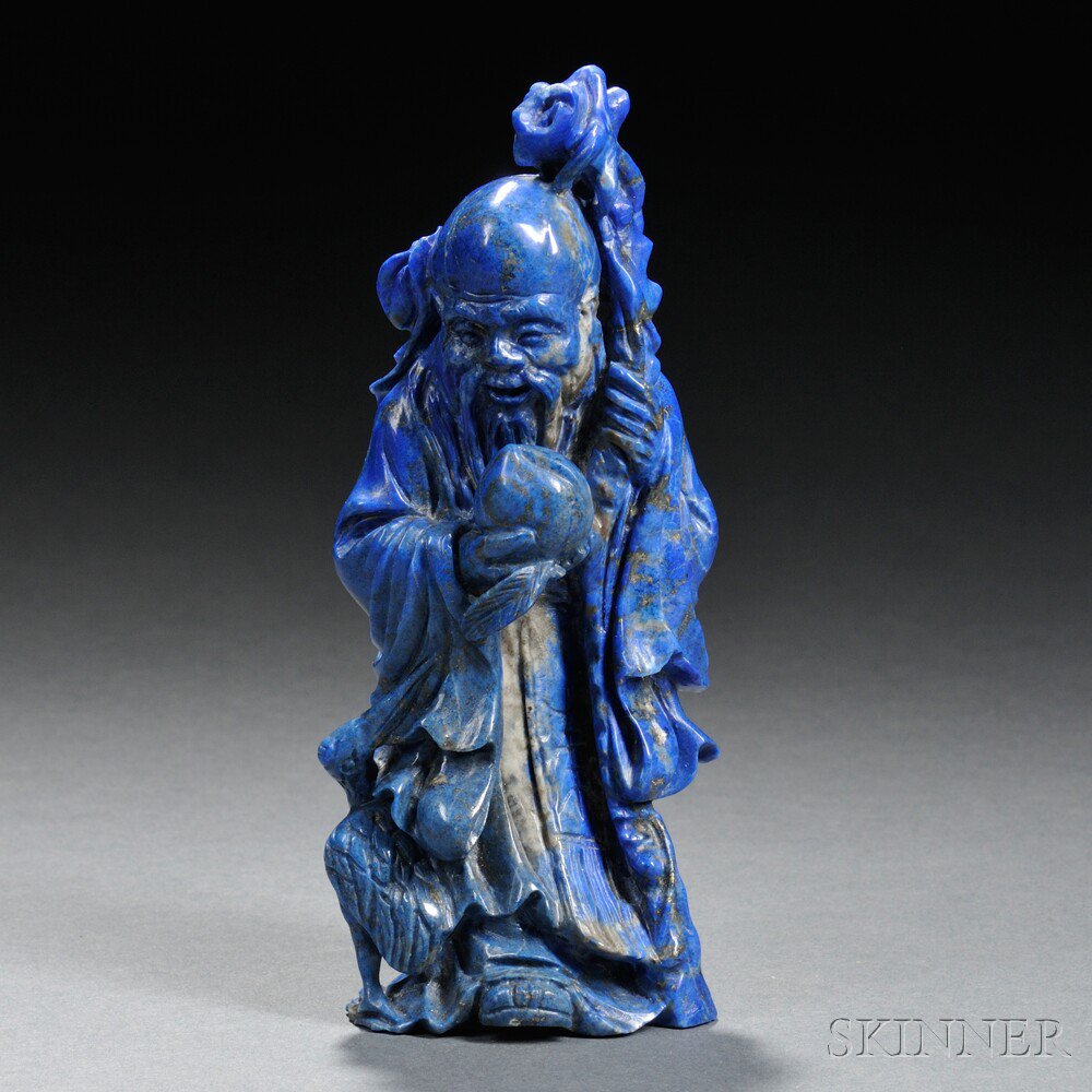 Appraisal: Lapis Lazuli Carving of Shoulao China depicted standing beside a