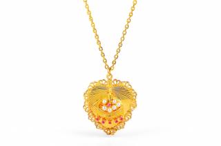 Appraisal: A Gold Heart-Shaped Pendant Necklace Set with pearls and circular